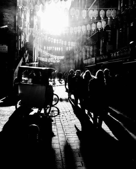 Between the traﬃc / London China town - by Laurence Pang
