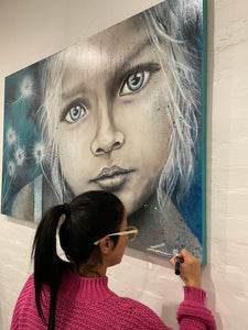 Make a Wish / Aqua - Portrait of an innocent and beautiful child with dreamy blue eyes, surrounded by fluffy white dandelions on a jade and aqua blue backdrop, symbolic of purity and hope. Painted with mixed medium on a 1x1.5m stretched canvas.